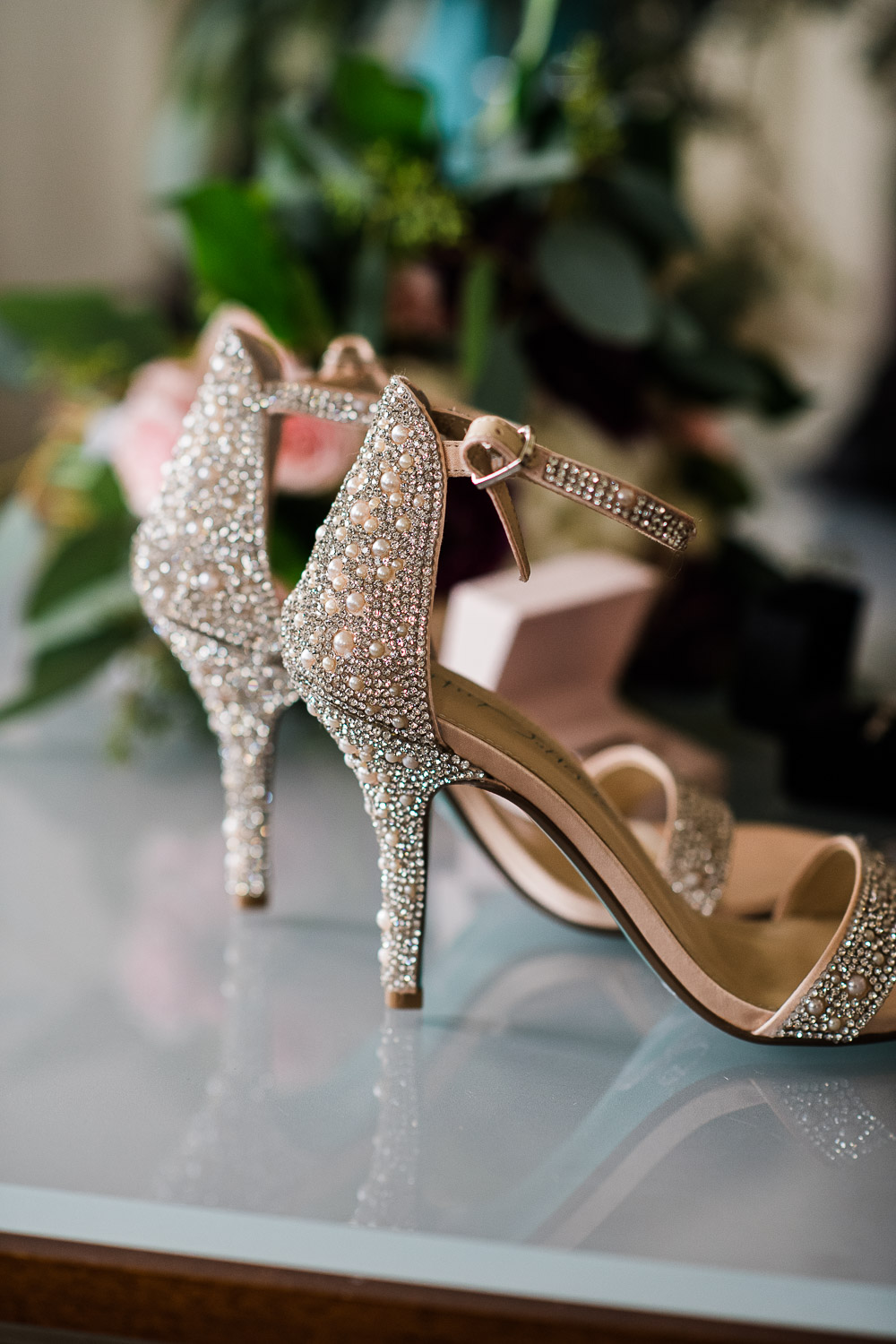 side angle of pearl and crystal studded bridal heels