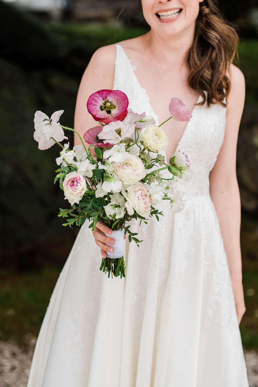 bride with her bouquet at Mount Hope Farm