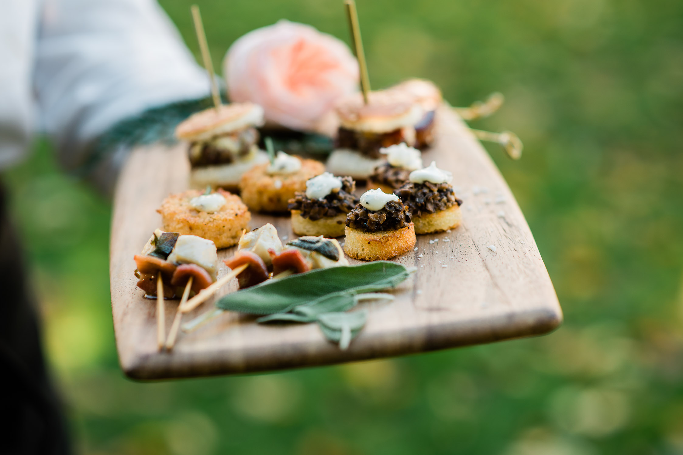 assorted appetizers on wood tray at the Glen Manor House