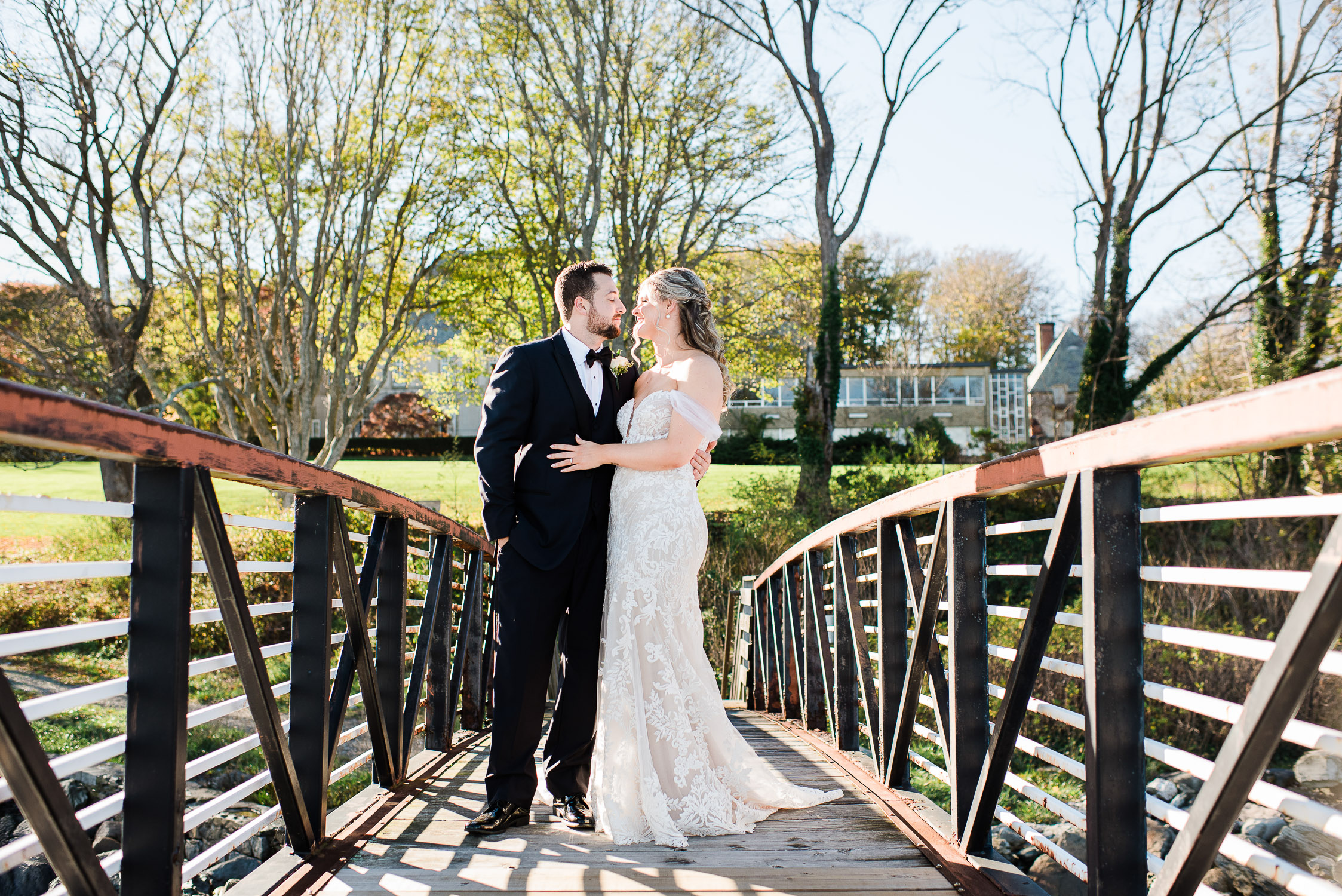 bride and grrom on bridge at Glen Manor House