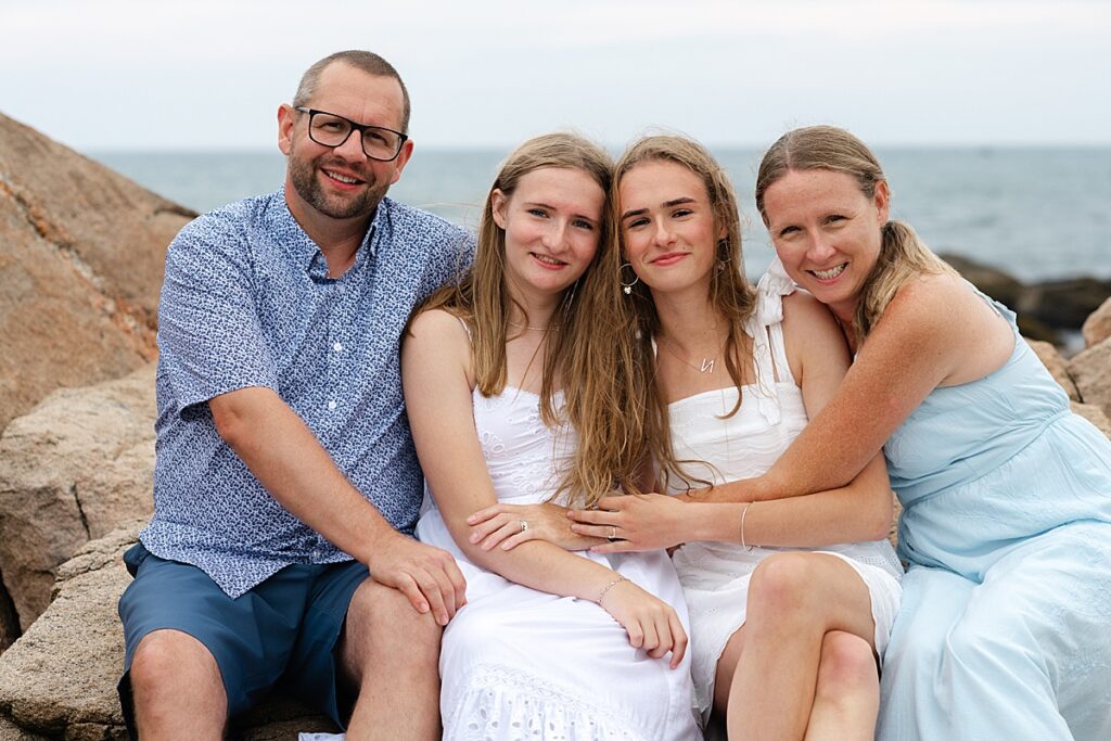 Family portrait in Narragansett featuring a natural, seaside setting