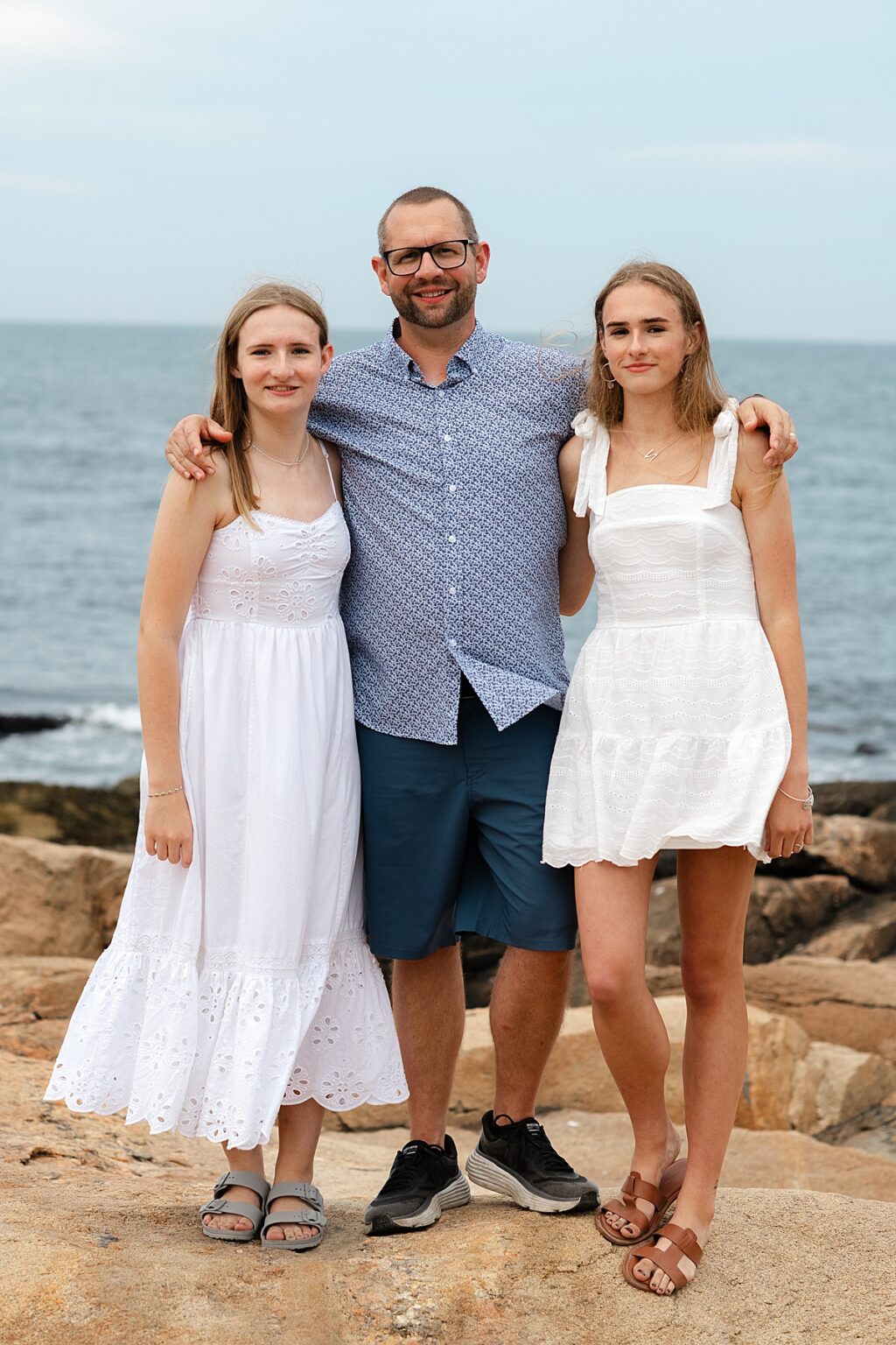 Family portrait on rocky coast in Narragansett