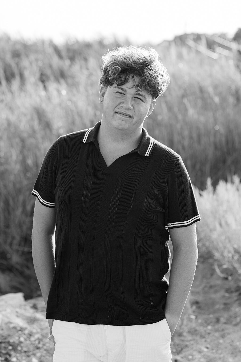 Relaxed senior portrait captured in natural light outdoors