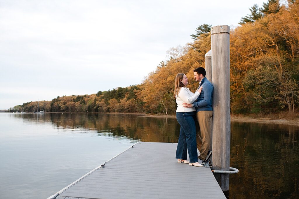 couple embracing on a dock