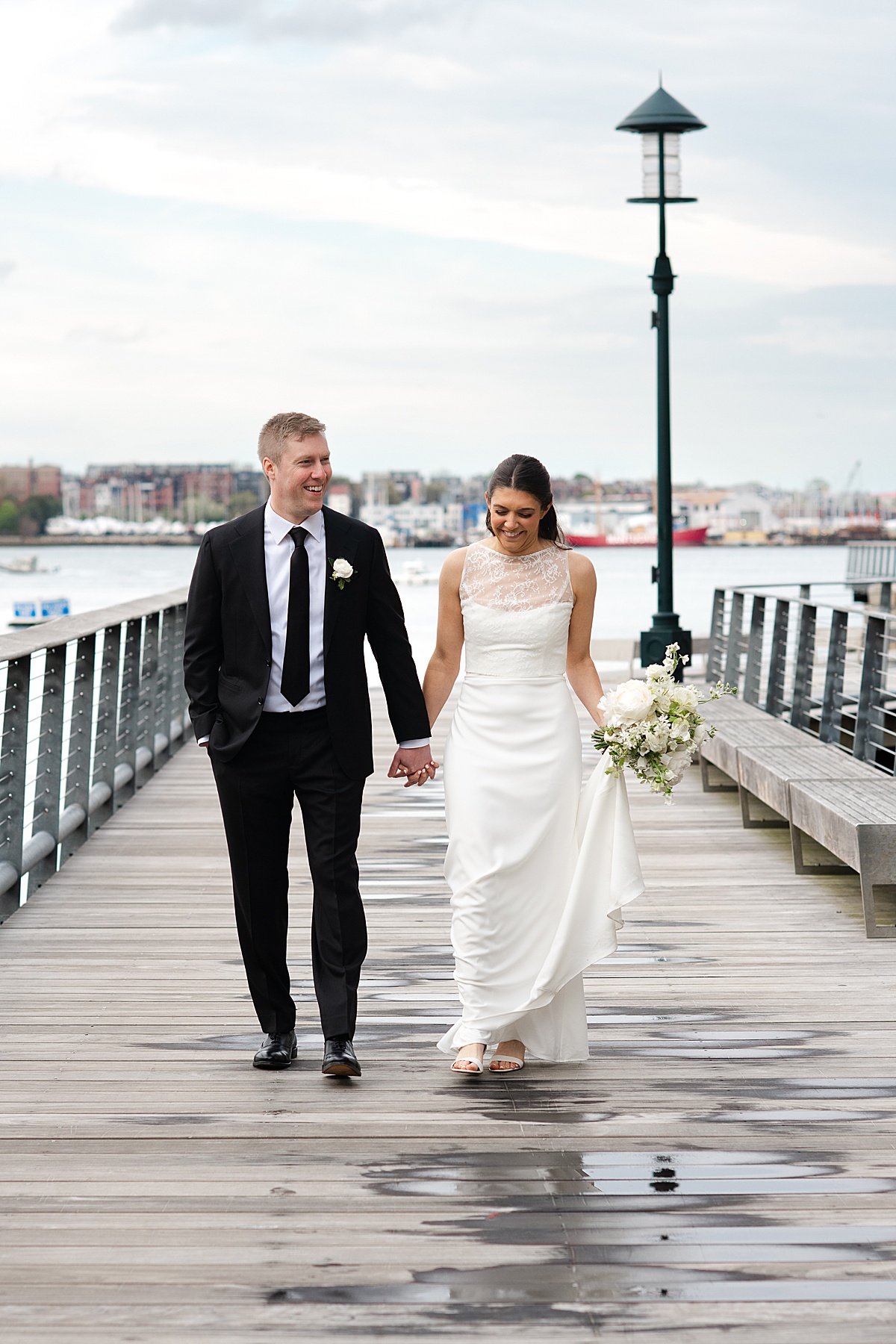 married couple walking on dock by the ICA Boston