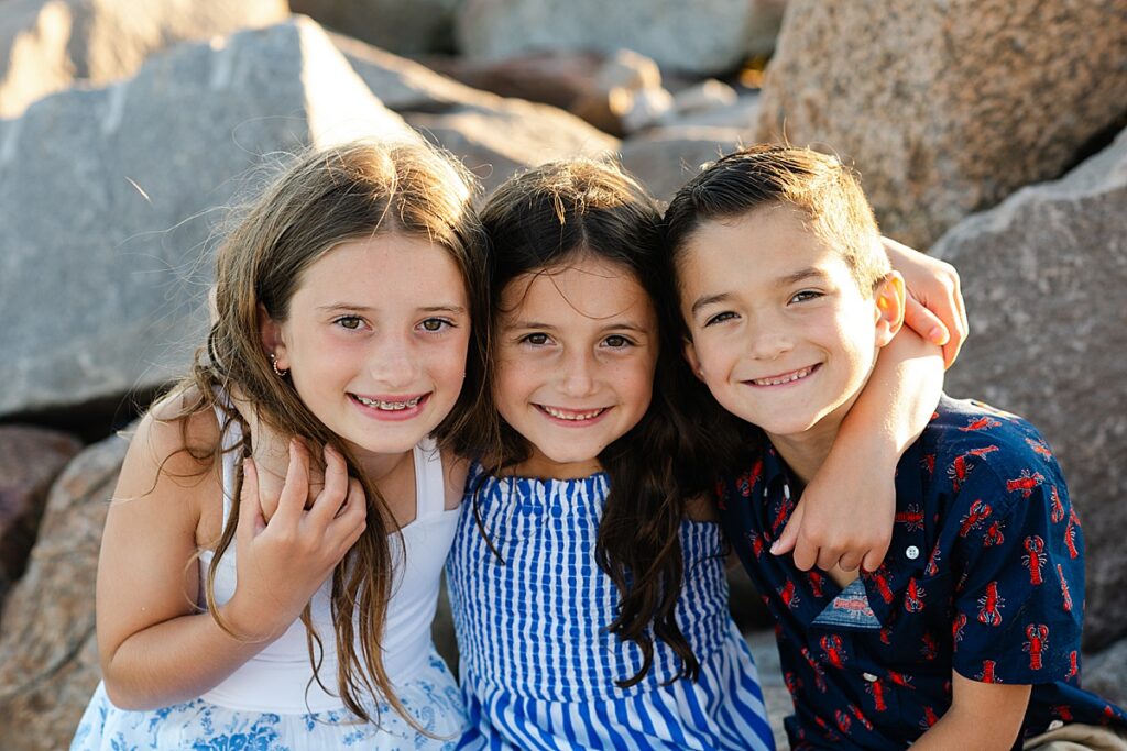 Relaxed family portraits by the ocean in Rhode Island